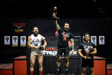 tommy lovell on 1st place podium at official strongman games strongman world championship